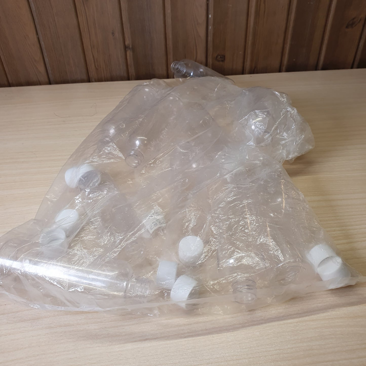 Transparent PET plastic bottles, often used as portable 100ml containers for shampoo or travel kits.#6885