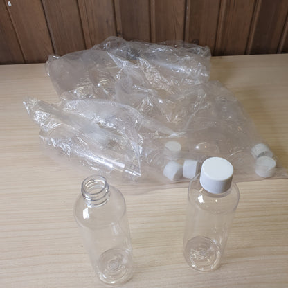 Transparent PET plastic bottles, often used as portable 100ml containers for shampoo or travel kits.#6885