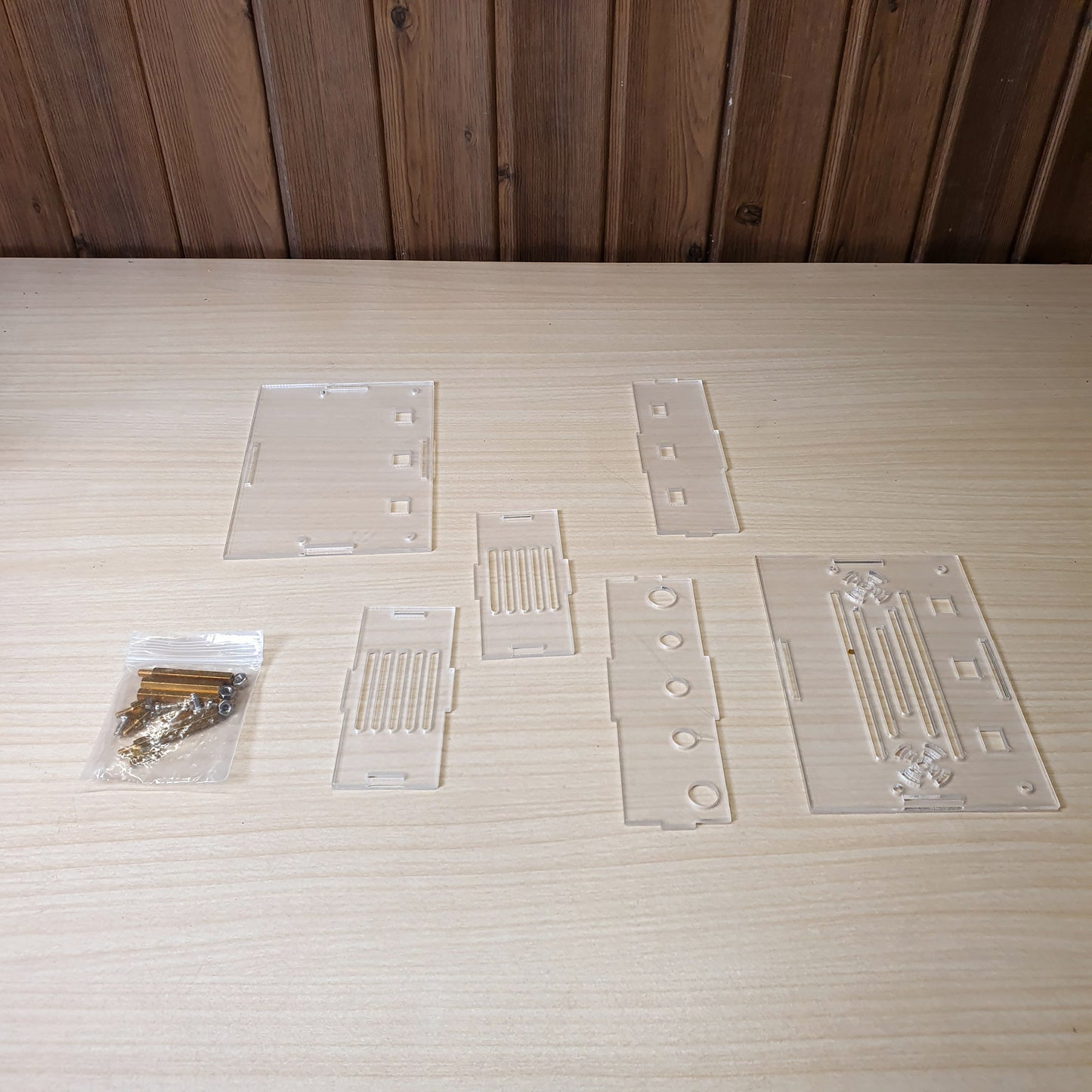 DIY assembly kit featuring precision-cut transparent acrylic panels.#8075