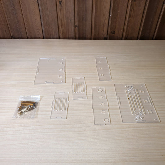 DIY assembly kit featuring precision-cut transparent acrylic panels.#8075
