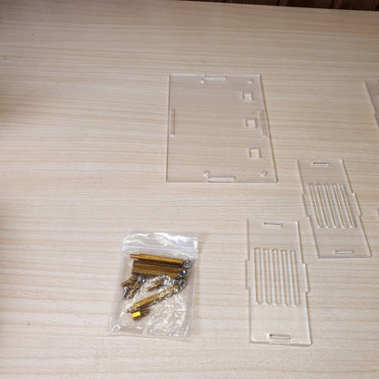DIY assembly kit featuring precision-cut transparent acrylic panels.#8075