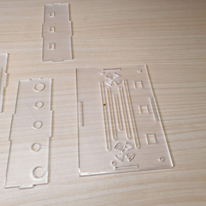 DIY assembly kit featuring precision-cut transparent acrylic panels.#8075