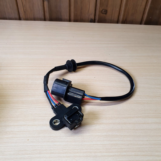 Crankshaft position sensor, identified in search results as compatible with various Mitsubishi models such as the Lancer and Space Star. #8081