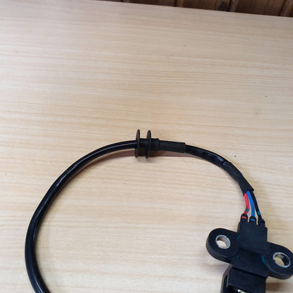 Crankshaft position sensor, identified in search results as compatible with various Mitsubishi models such as the Lancer and Space Star. #8081