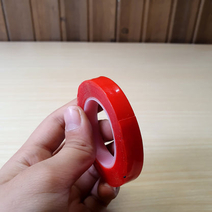Red-lined, high-strength acrylic double-sided tape, commonly used for automotive trim, electronics repair, or heavy-duty mounting. #8290