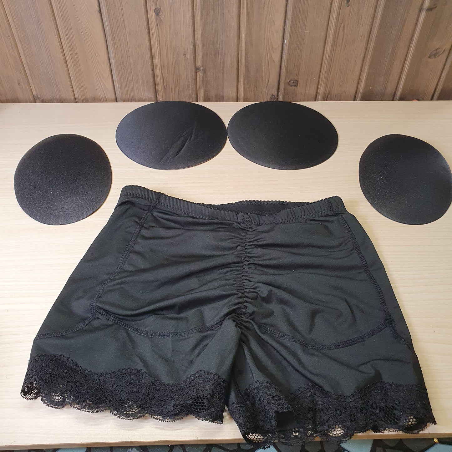 Black AfruliA hip-enhancing shaper features lace trim and includes removable pads for added volume.#8219
