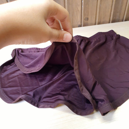 Deep plum active shorts feature a lightweight, stretchy fabric designed for movement.#8332