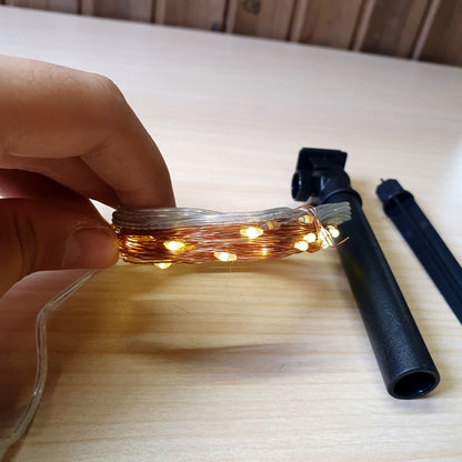 Solar-powered LED fairy lights featuring a compact panel and versatile copper wire strand. #8177