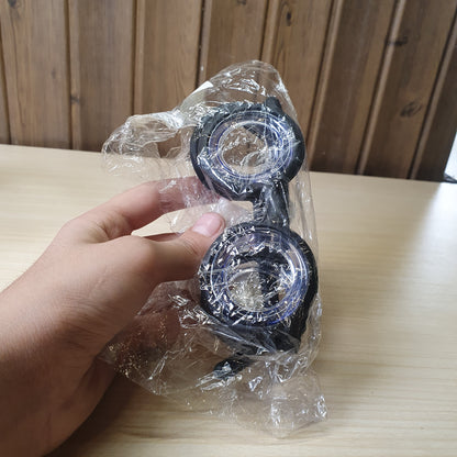 Motion sickness glasses feature a unique lensless frame design with liquid-filled rings that create an artificial horizon to reduce nausea. #8581