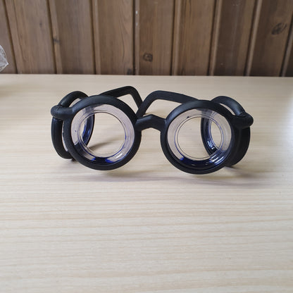 Motion sickness glasses feature a unique lensless frame design with liquid-filled rings that create an artificial horizon to reduce nausea. #8581