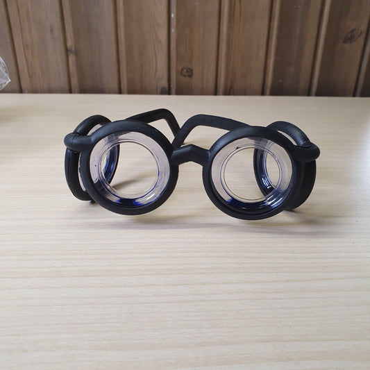 Motion sickness glasses feature a unique lensless frame design with liquid-filled rings that create an artificial horizon to reduce nausea. #8581