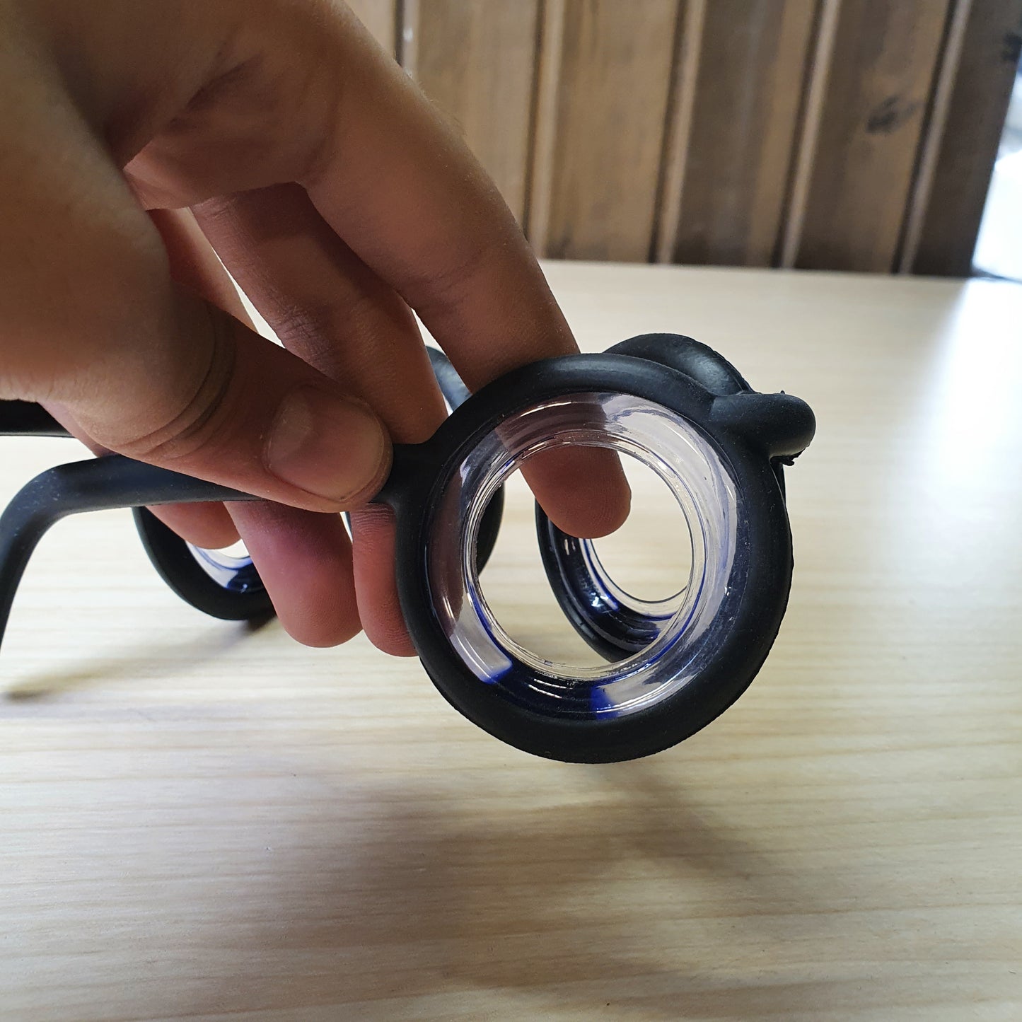 Motion sickness glasses feature a unique lensless frame design with liquid-filled rings that create an artificial horizon to reduce nausea. #8581