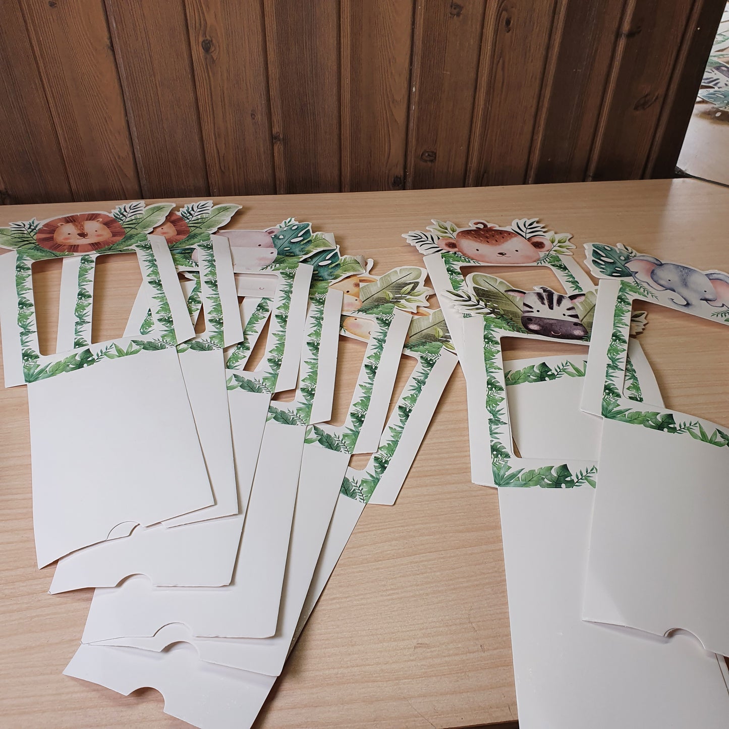 Jungle animal-themed photo frames are designed as a banner for a "Wild One" first birthday party or baby shower. #8399