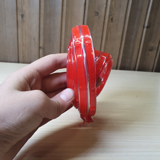 Flexible, Red-colored furniture edge protector strip designed to prevent injuries from sharp corners #8426