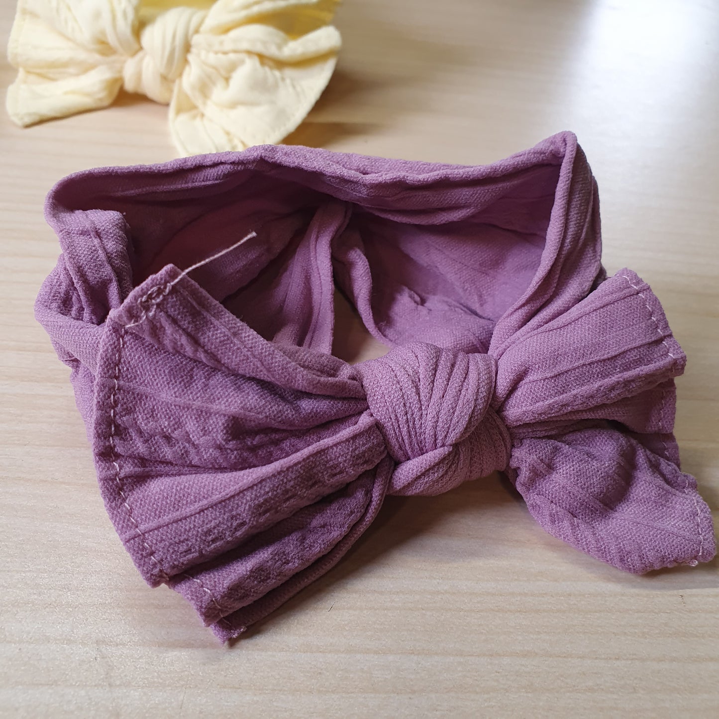 purple, soft, ribbed-knit headband features a large, integrated bow Pack Of 3  #8223