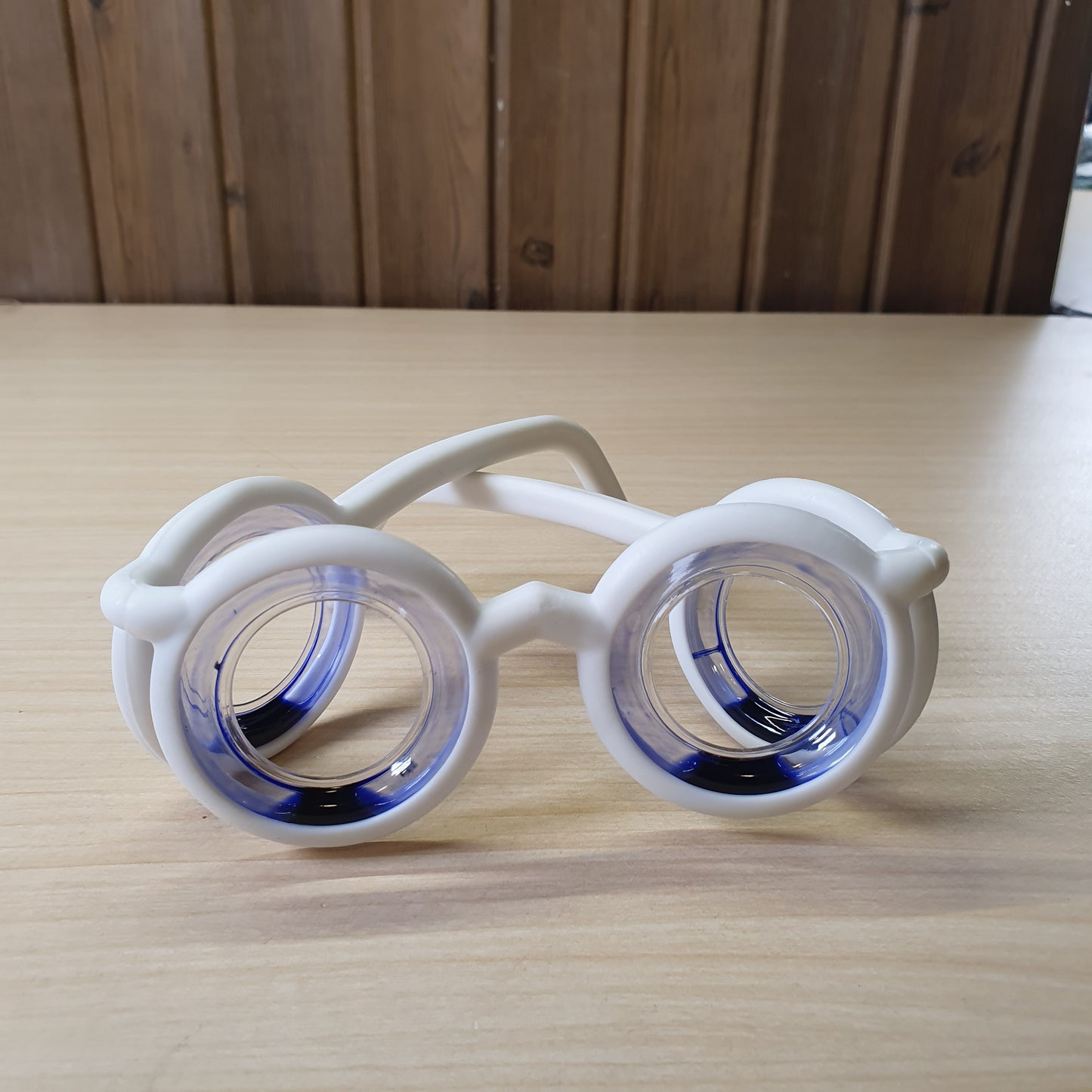 Anti-motion sickness glasses feature liquid-filled rings to create an artificial horizon. #8306