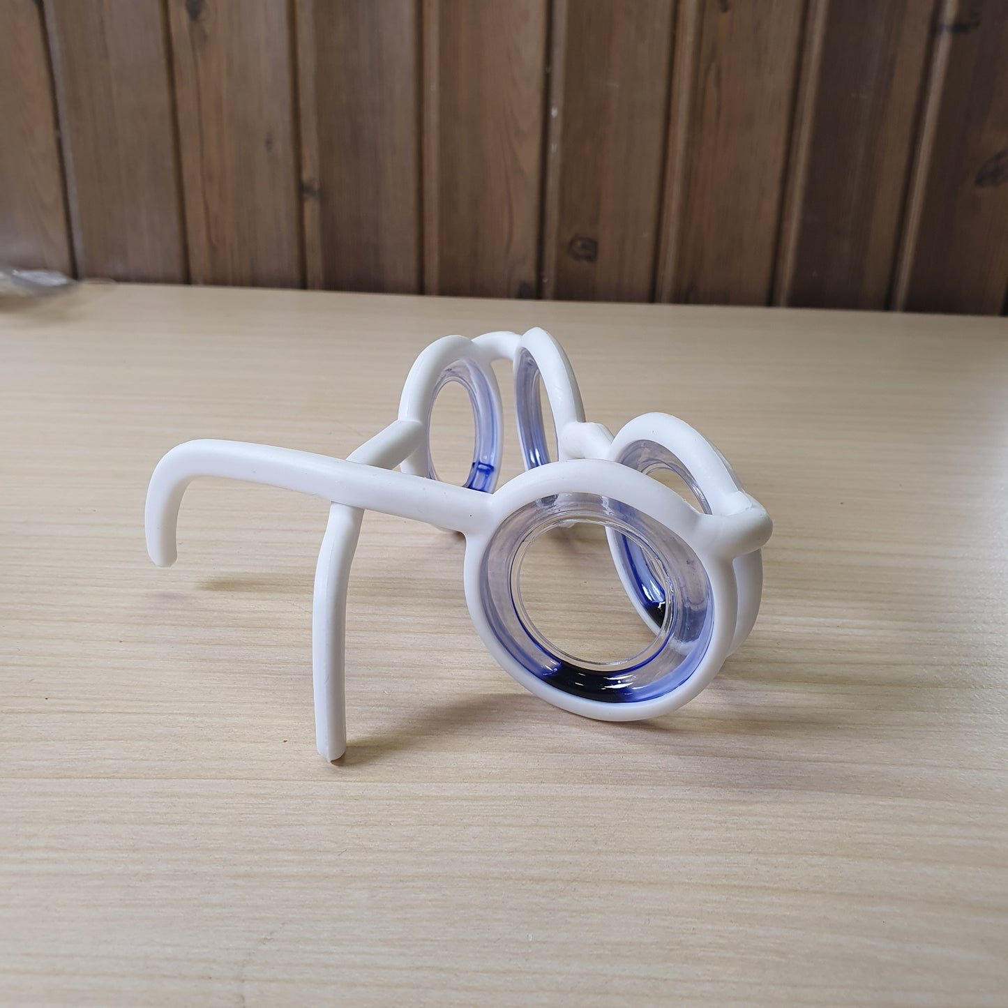 Anti-motion sickness glasses feature liquid-filled rings to create an artificial horizon. #8306
