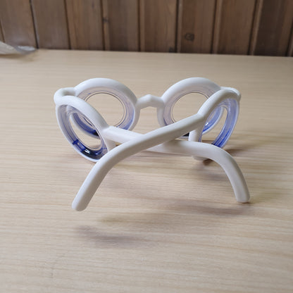 Anti-motion sickness glasses feature liquid-filled rings to create an artificial horizon. #8306