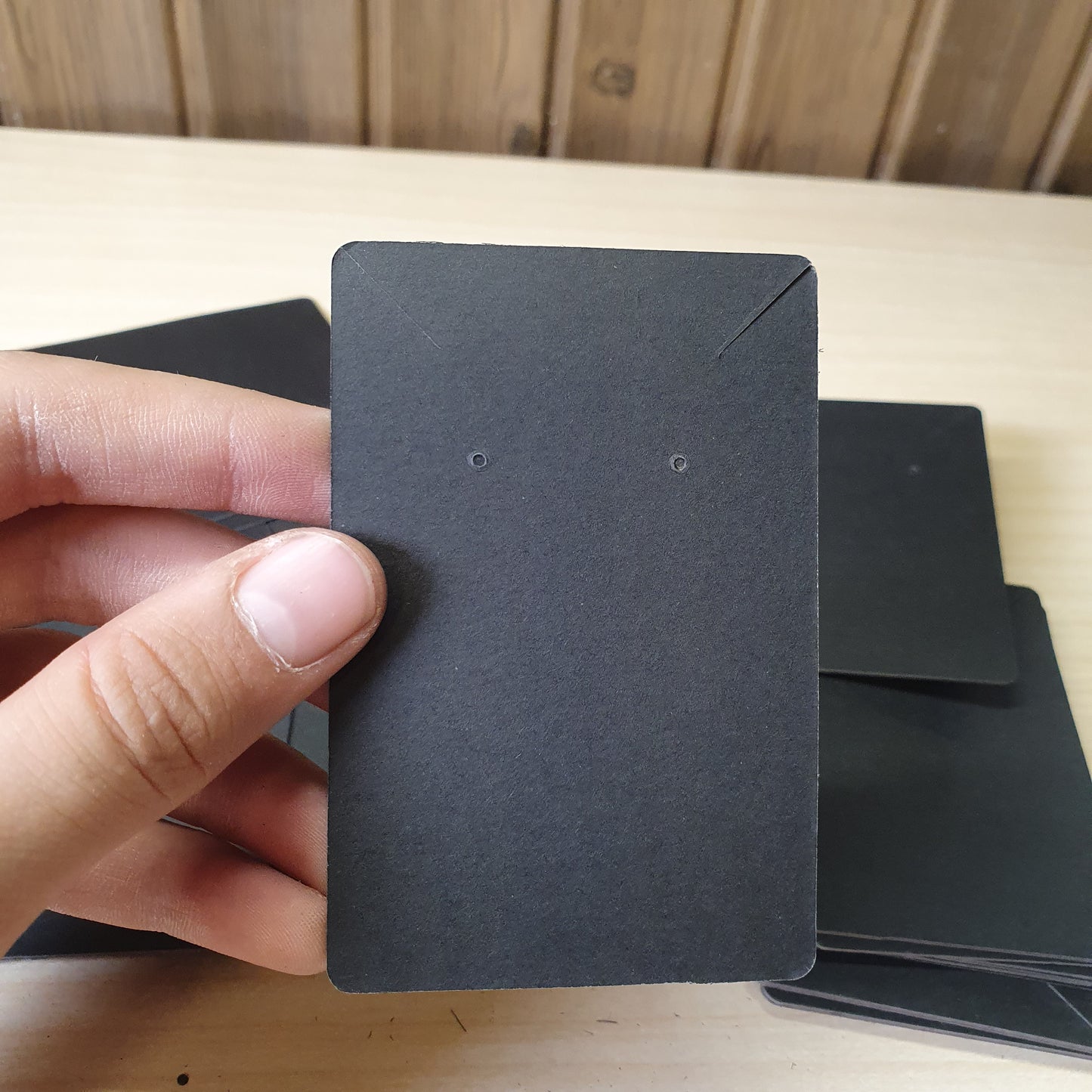 Blank black earring display cards commonly used for jewelry packaging.#8233
