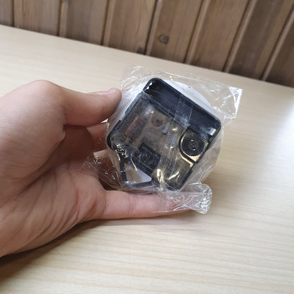 Quartz clock movement, a common mechanism for replacing or building DIY wall clocks. #8351