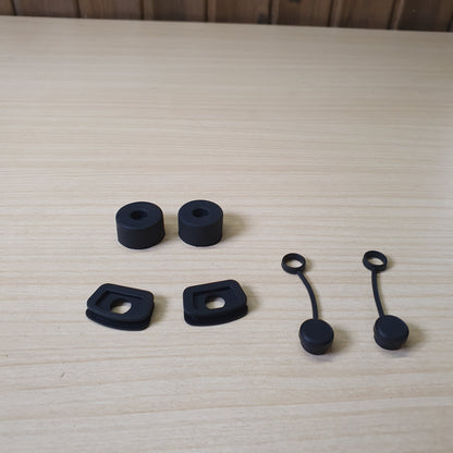 Black silicone pieces are accessories designed to make tumblers spill-proof.#8648