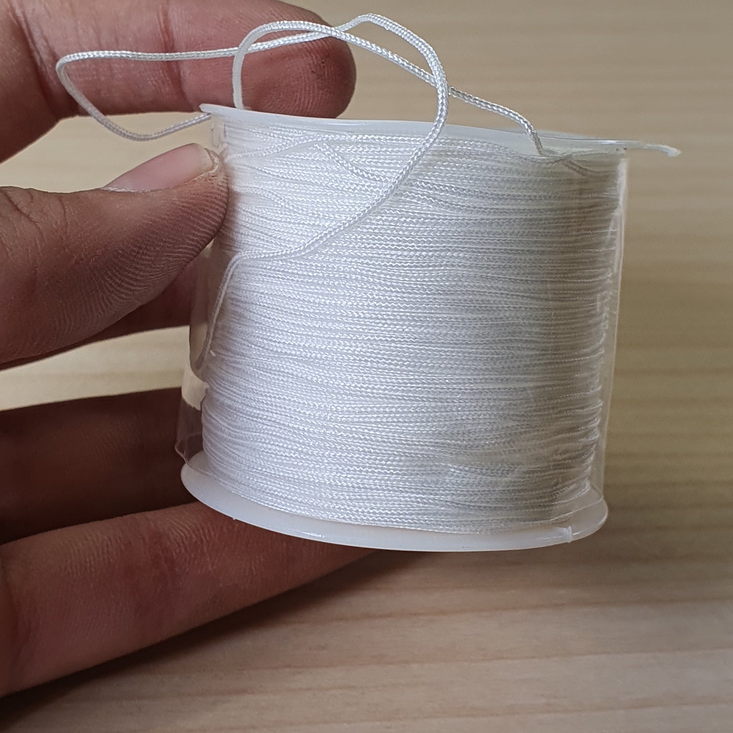 Spool of 0.8mm to 1mm white nylon cord,#8131