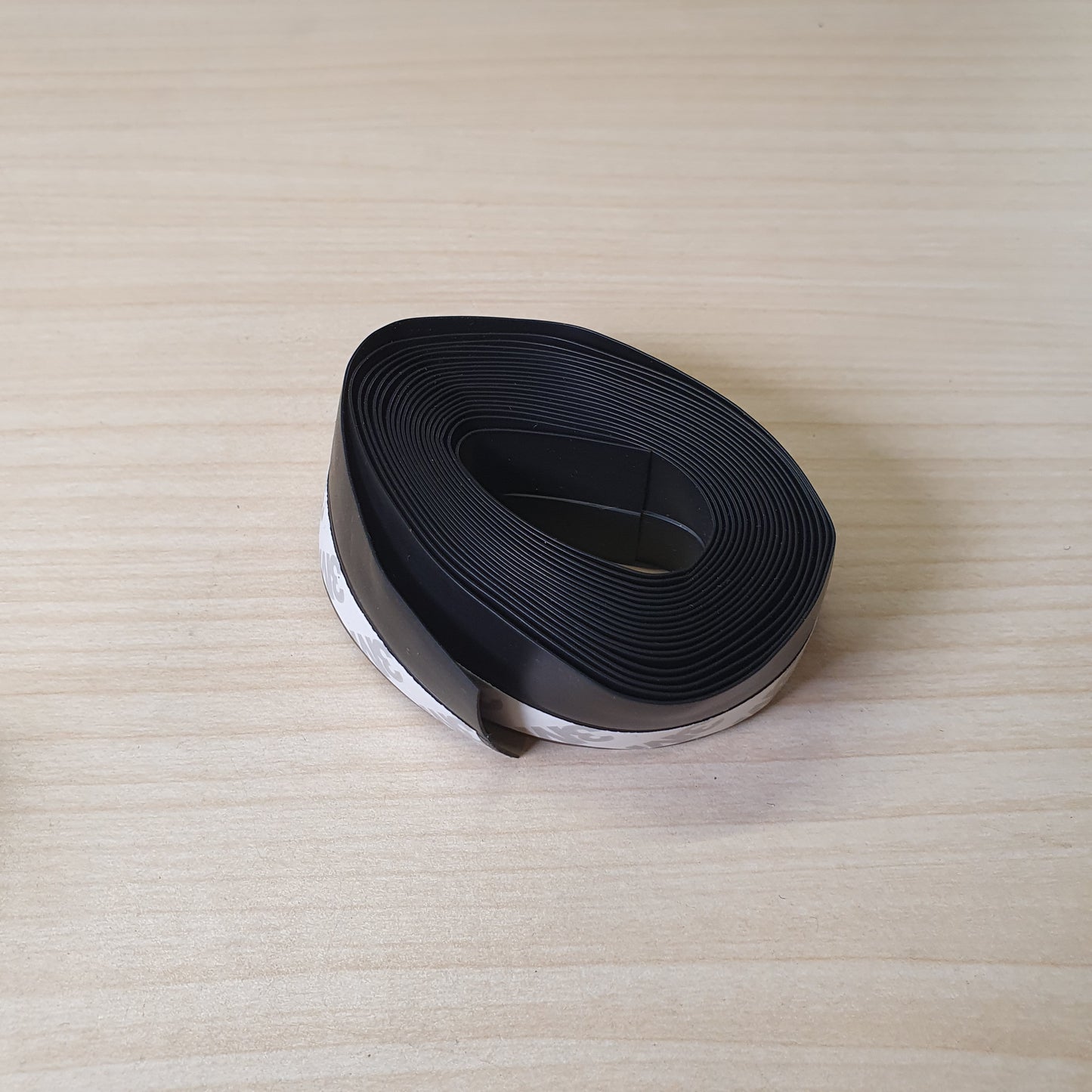 Flexible black rubber weather stripping or seal tape #8278