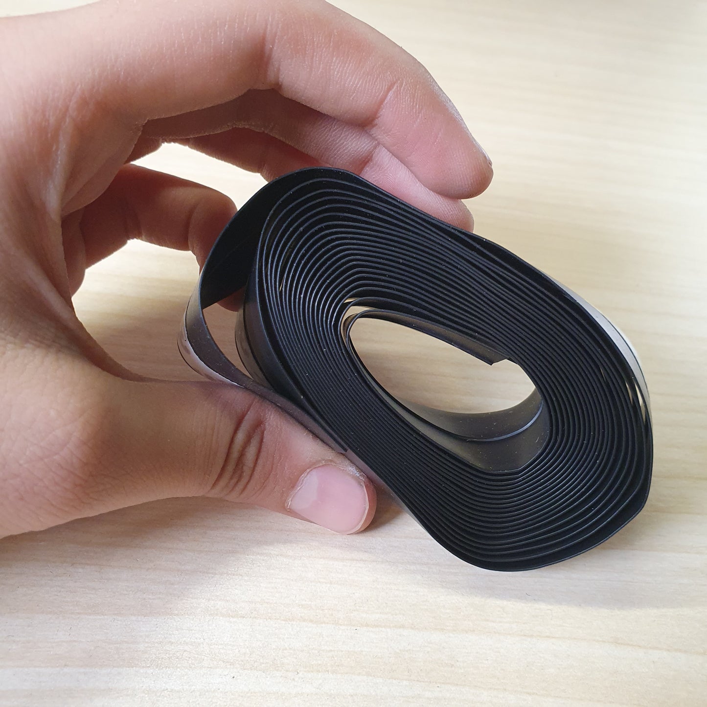 Flexible black rubber weather stripping or seal tape #8278