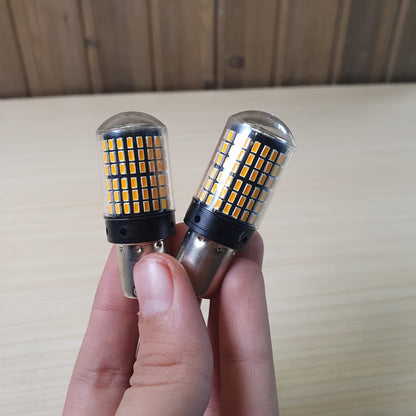 Amber LED bulbs designed for automotive turn signals or indicator lights. #9136