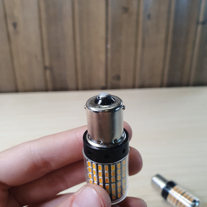 Amber LED bulbs designed for automotive turn signals or indicator lights. #9136
