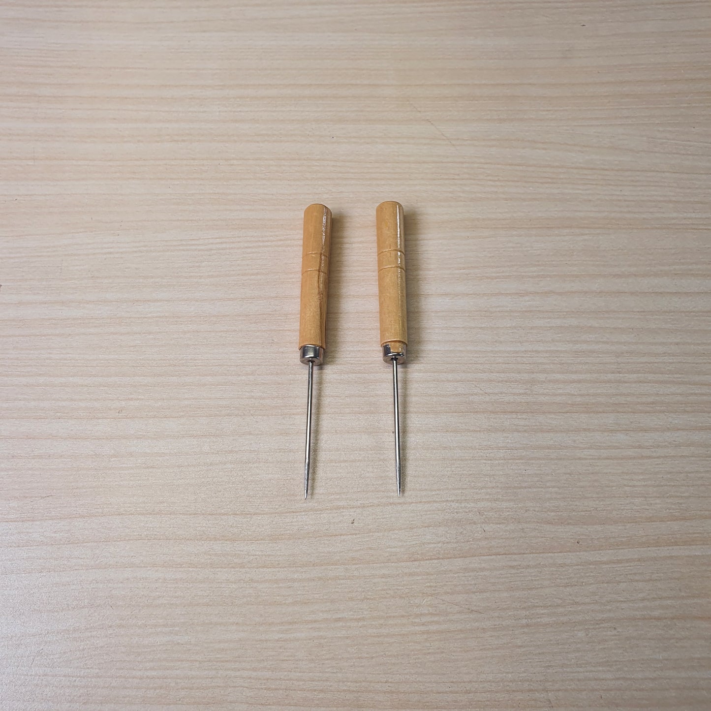 Leatherworking awls, commonly used for punching holes in leather or heavy fabrics for stitching. #9142