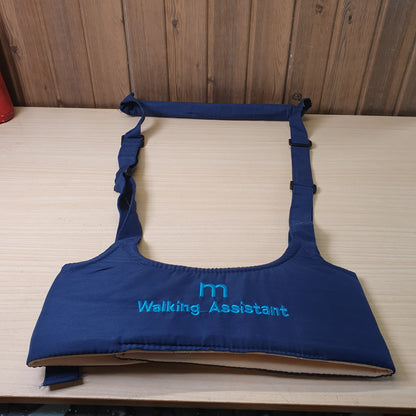 Blue baby walking assistant harness features adjustable straps and embroidered text. # 9273
