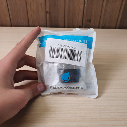 European travel adapter designed to convert American flat-pin plugs to European round-pin sockets. #9147