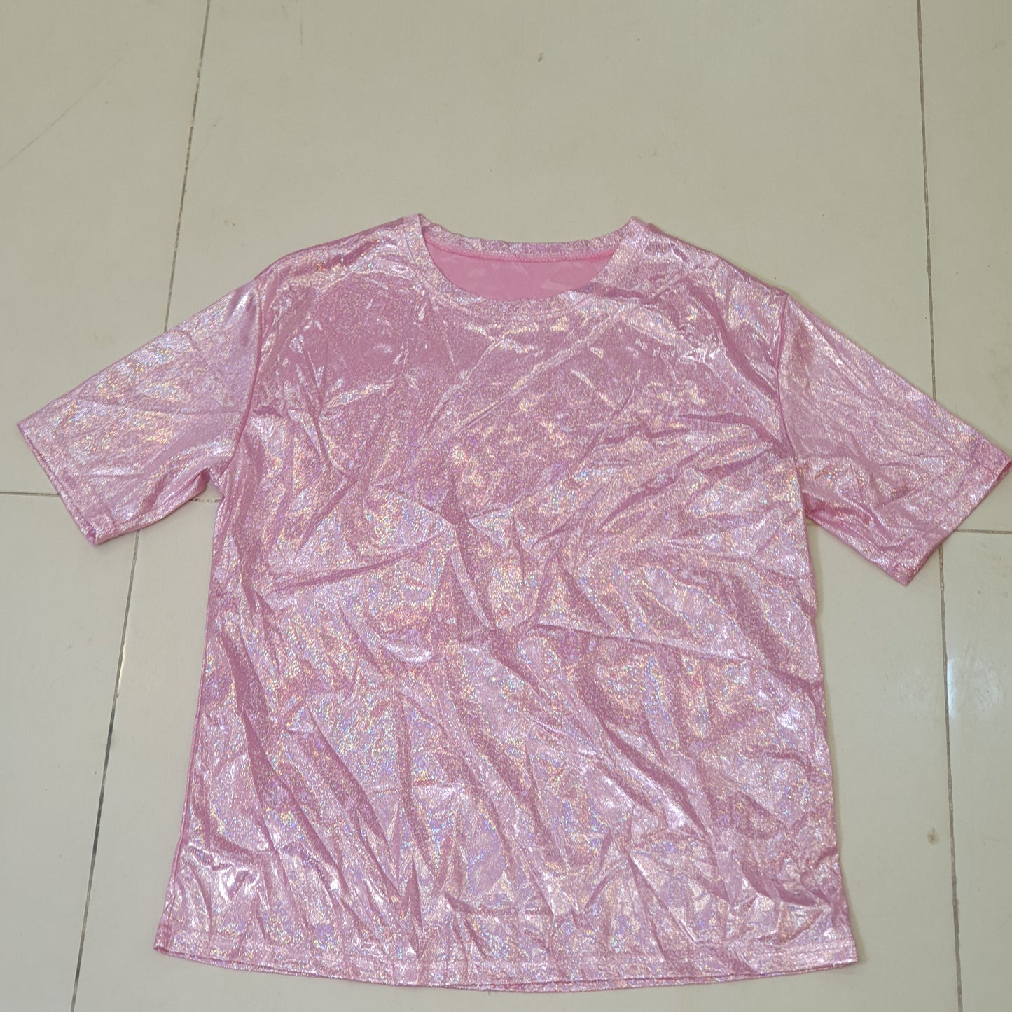 Pink top resembles a shiny holographic shirt #9115