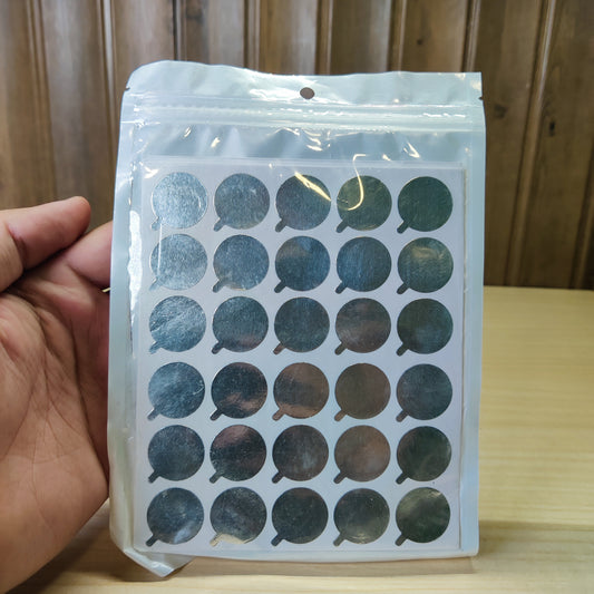 Disposable aluminum foil stickers designed for use as eyelash glue holders during extension applications. #512