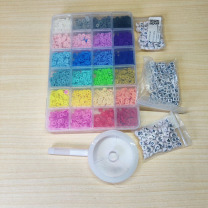 DIY jewelry making kit featuring colorful polymer clay heishi beads organized in a clear grid box. #517
