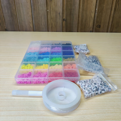 DIY jewelry making kit featuring colorful polymer clay heishi beads organized in a clear grid box. #517