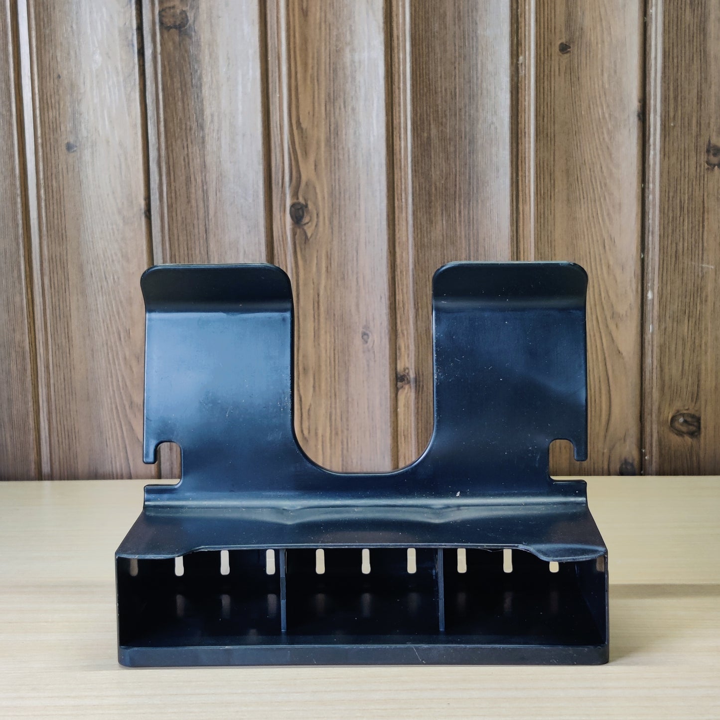 Black plastic wall-mounted hair dryer holder and styling tool organizer.#2332