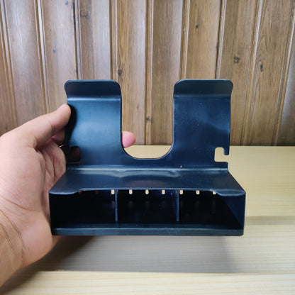 Black plastic wall-mounted hair dryer holder and styling tool organizer.#2332