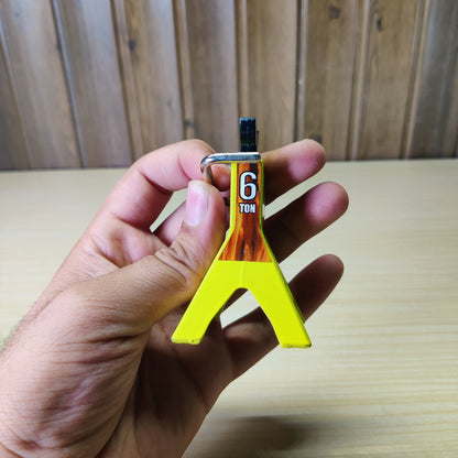 Miniature yellow metal jack stand designed as a decorative accessory for 1/10 scale RC rock crawler cars#2305