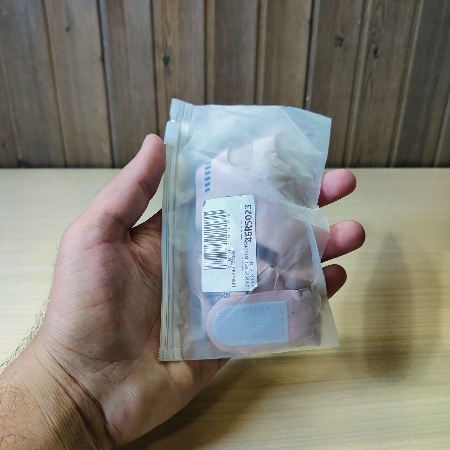 face lifting strap designed to act as a double chin reducer, commonly sold in pink or purple fabric.#4884